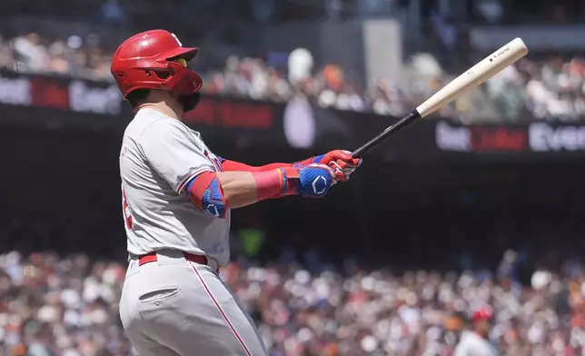 Philadelphia Phillies' Kyle Schwarber watches his two-run home run against the San Francisco Giants during the third inning of a baseball game in San Francisco, Monday, May 27, 2024. (AP Photo/Jeff Chiu)