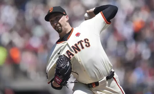 San Francisco Giants pitcher Blake Snell works against the Philadelphia Phillies during the first inning of a baseball game in San Francisco, Monday, May 27, 2024. (AP Photo/Jeff Chiu)