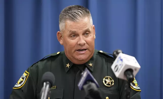 Okaloosa County Sheriff Eric Aden holds a news conference where he shared deputy body cam footage of the May 3, 2024 shooting of Roger Fortson, a U.S. Navy airman, Thursday, May 9, 2024, in Fort Walton Beach, Fla. Fortson was shot in his apartment after a response to a complaint. (AP Photo/Gerald Herbert)