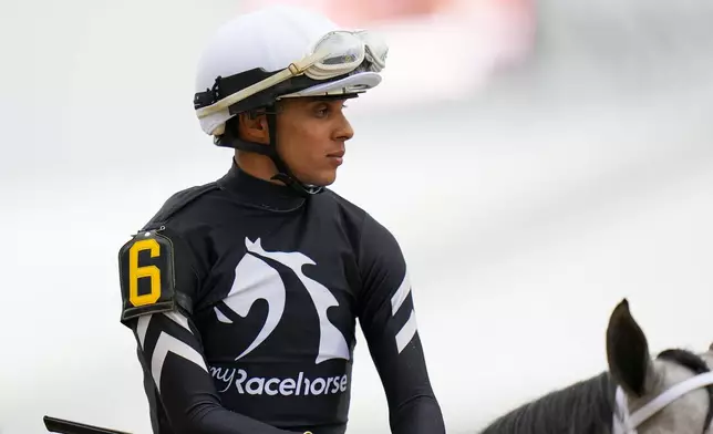 Jaime Torres, atop Seize The Grey, looks on during post time prior to participating and winning the Preakness Stakes horse race at Pimlico Race Course, Saturday, May 18, 2024, in Baltimore. (AP Photo/Julio Cortez)