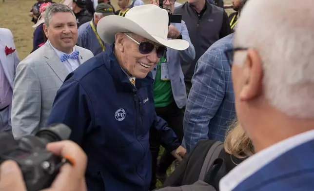 Seize The Grey's trainer D. Wayne Lukas, center, reacts after his horse won the Preakness Stakes horse race at Pimlico Race Course, Saturday, May 18, 2024, in Baltimore. (AP Photo/Julia Nikhinson)