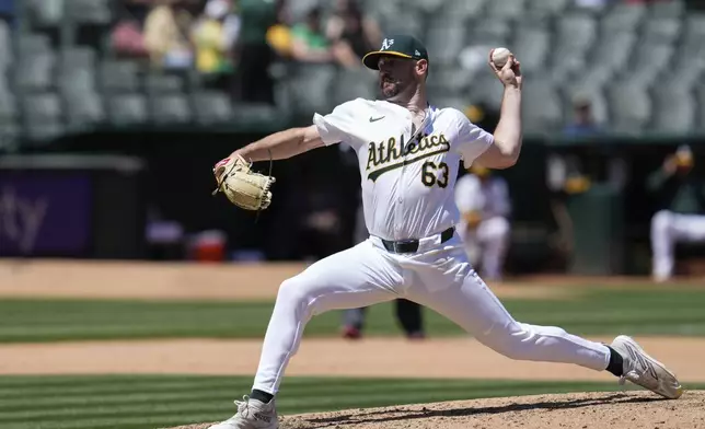 Oakland Athletics pitcher Hogan Harris throws to a Texas Rangers batter during the fifth inning of a baseball game Tuesday, May 7, 2024, in Oakland, Calif. (AP Photo/Godofredo A. Vásquez)