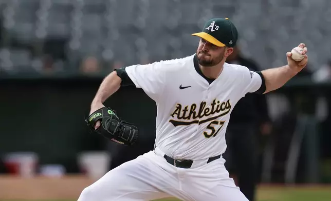 Oakland Athletics pitcher Alex Wood throws to a Texas Rangers batter during the first inning of a baseball game Monday, May 6, 2024, in Oakland, Calif. (AP Photo/Godofredo A. Vásquez)