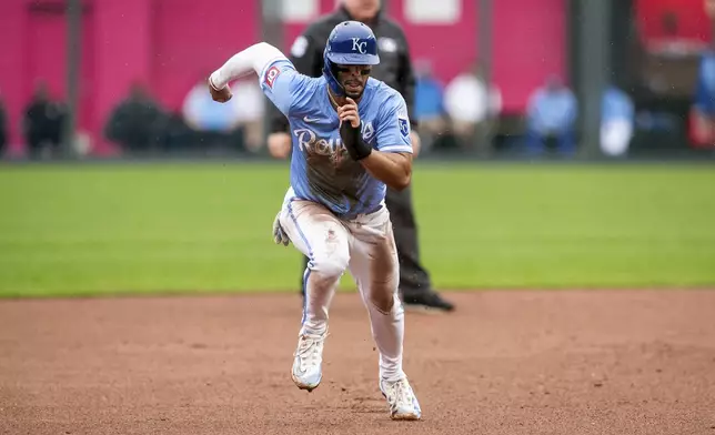 Kansas City Royals outfielder MJ Melendez runs towards third base during the fifth inning of a baseball game against the Texas Rangers, Sunday, May 5, 2024, in Kansas City, Mo. (AP Photo/Nick Tre. Smith)