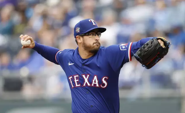 Texas Rangers pitcher Dane Dunning delivers to a Kansas City Royals batter during the first inning of a baseball game in Kansas City, Mo., Saturday, May 4, 2024. (AP Photo/Colin E. Braley)