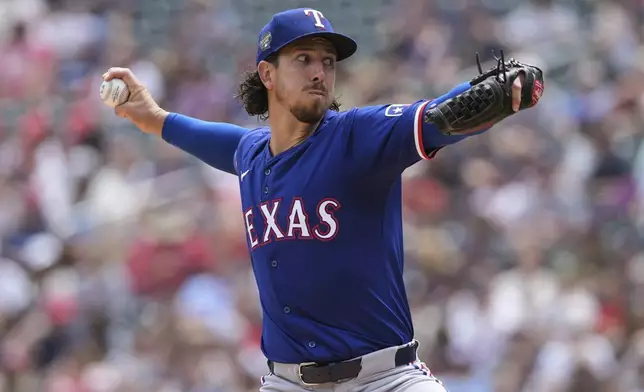 Texas Rangers starting pitcher Michael Lorenzen delivers during the second inning of a baseball game against the Minnesota Twins, Saturday, May 25, 2024, in Minneapolis. (AP Photo/Abbie Parr)