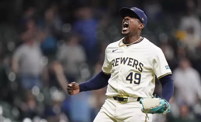 Milwaukee Brewers' Thyago Vieira reacts to the last out of a baseball game against the Tampa Bay Rays Tuesday, April 30, 2024, in Milwaukee. (AP Photo/Aaron Gash)
