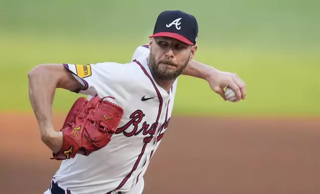 Atlanta Braves pitcher Chris Sale delivers to a against the Boston Red Sox batter in the first inning of a baseball game Wednesday, May 8, 2024, in Atlanta. (AP Photo/John Bazemore)