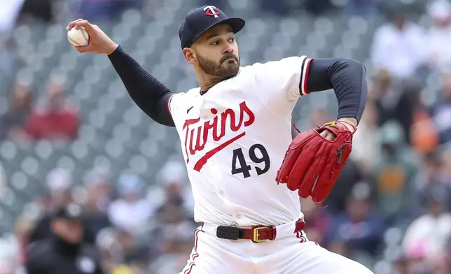 Minnesota Twins' starting pitcher Pablo López delivers against the Boston Red Sox during the first inning of a baseball game, Saturday, May 4, 2024, in Minneapolis. (AP Photo/Matt Krohn)