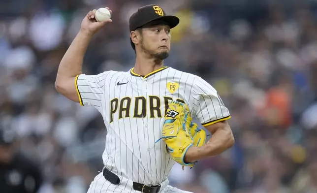 San Diego Padres starting pitcher Yu Darvish works against a Cincinnati Reds batter during the first inning of a baseball game, Tuesday, April 30, 2024, in San Diego. (AP Photo/Gregory Bull)