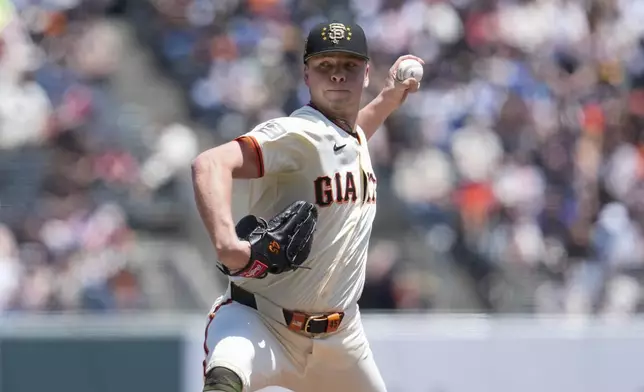 San Francisco Giants pitcher Kyle Harrison throws to a Colorado Rockies batter during the first inning of a baseball game Saturday, May 18, 2024, in San Francisco. (AP Photo/Godofredo A. Vásquez)