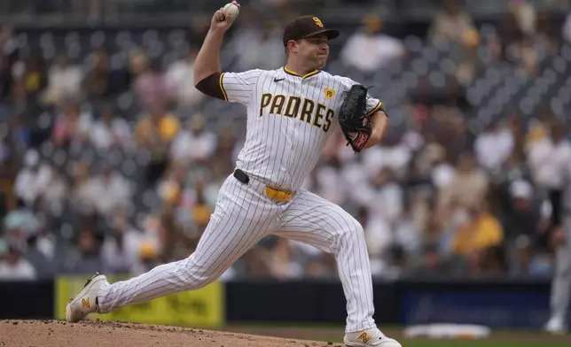 San Diego Padres starting pitcher Michael King works against a Colorado Rockies batter during the first inning of a baseball game, Wednesday, May 15, 2024, in San Diego. (AP Photo/Gregory Bull)