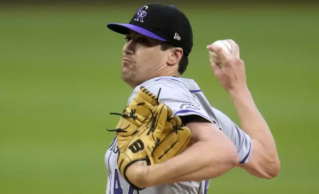Colorado Rockies starting pitcher Cal Quantrill delivers during the first inning of a baseball game against the Pittsburgh Pirates in Pittsburgh, Friday, May 3, 2024. (AP Photo/Gene J. Puskar)