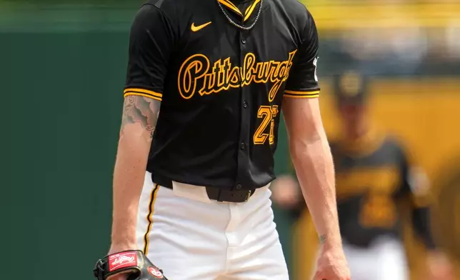 Pittsburgh Pirates starting pitcher Bailey Falter pauses on the mound after giving up back-to-back home runs during the second inning of a baseball game against the Colorado Rockies in Pittsburgh, Sunday, May 5, 2024. (AP Photo/Gene J. Puskar)