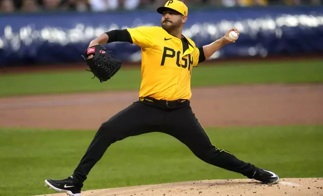 Pittsburgh Pirates starting pitcher Martín Pérez delivers during the first inning of a baseball against the Colorado Rockies in Pittsburgh, Friday, May 3, 2024. (AP Photo/Gene J. Puskar)