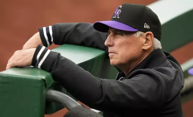 Colorado Rockies manager Bud Black stands in the dugout during the first inning of a baseball game against the Pittsburgh Pirates in Pittsburgh, Saturday, May 4, 2024. (AP Photo/Gene J. Puskar)