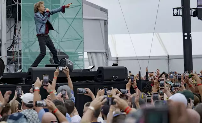 Mick Jagger of the Rolling Stones performs during the New Orleans Jazz and Heritage Festival in New Orleans, Thursday, May 2, 2024. (AP Photo/Matthew Hinton)
