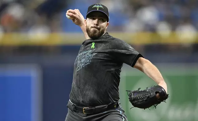 Tampa Bay Rays starting pitcher Aaron Civale throws from the mound during the first inning of a baseball game against the Kansas City Royals, Saturday, May 25, 2024, in St. Petersburg, Fla. (AP Photo/Phelan M. Ebenhack)