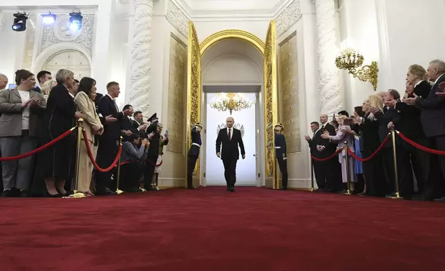 Vladimir Putin arrives for his inauguration ceremony as Russian President in the Grand Kremlin Palace in Moscow, Russia, Tuesday, May 7, 2024. (Sergei Bobylev, Sputnik, Kremlin Pool Photo via AP)