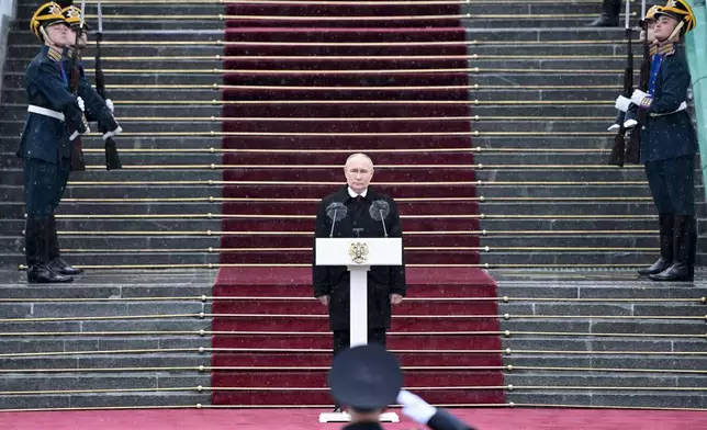 Russian President Vladimir Putin speaks to honour guards of the Presidential regiment following his inauguration ceremony at the Kremlin in Moscow, Russia, Tuesday, May 7, 2024. (Sergei Guneyev, Sputnik, Kremlin Pool Photo via AP)