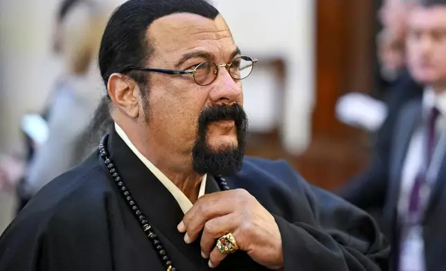 American action-movie actor Steven Seagal arrives for Vladimir Putin's inauguration ceremony as Russian president in the Grand Kremlin Palace in Moscow, Russia, Tuesday, May 7, 2024. (Alexander Nemenov/Pool Photo via AP)