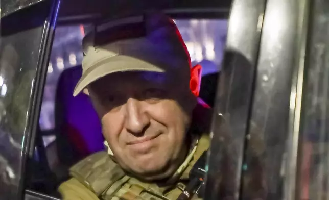 FILE - Yevgeny Prigozhin, head of the Wagner Group private military contractor, looks from a military vehicle leaving the Southern Military District in Rostov-on-Don, Russia, on June 24, 2023. Two months later, Prigozhin was killed in a mysterious plane crash after launching a brief uprising against the Defense Ministry in what represented the biggest threat to President Vladimir Putin. (AP Photo, File)
