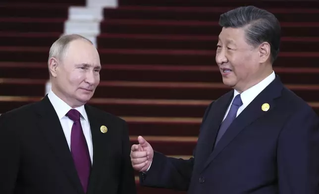 FILE - Russian President Vladimir Putin, left, and Chinese President Xi Jinping talk during their meeting on the sidelines of the Belt and Road Forum in Beijing, China, on Tuesday, Oct. 17, 2023. (Sergey Savostyanov, Sputnik, Kremlin Pool Photo via AP, File)