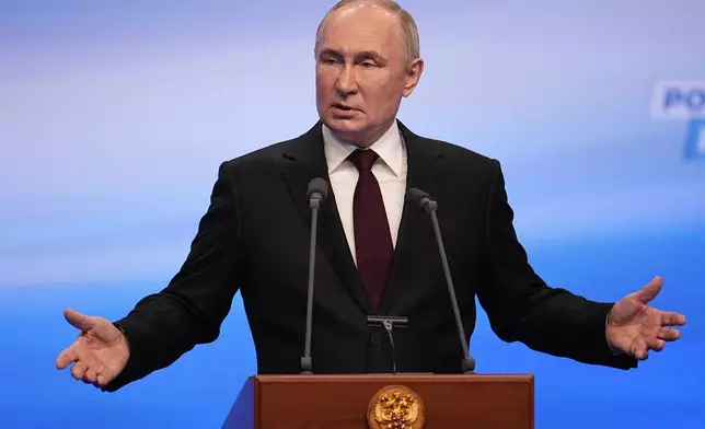 FILE - Russian President Vladimir Putin gestures while speaking on a visit to his campaign headquarters in Moscow, Russia, early on Monday, March 18, 2024, after his reelection. (AP Photo, File)