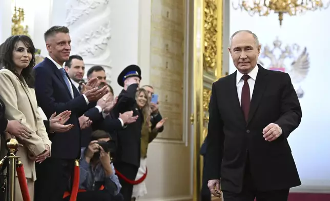 Vladimir Putin arrives for an inauguration ceremony to begin his fifth term as Russian president in the Grand Kremlin Palace in Moscow, Russia, Tuesday, May 7, 2024. (Sergei Bobylev, Sputnik, Kremlin Pool Photo via AP)