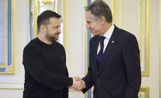 In this photo provided by the Ukrainian Presidential Press Office, Ukraine's President Volodymyr Zelenskyy, left, greets U.S. Secretary of State Antony Blinken, right, prior to their meeting in Kyiv, Ukraine, Tuesday, May 14, 2024. Blinken arrived in Kyiv on Tuesday in an unannounced diplomatic mission to reassure Ukraine that it has American support as it struggles to defend against increasingly intense Russian attacks. (Ukrainian Presidential Press Office via AP)