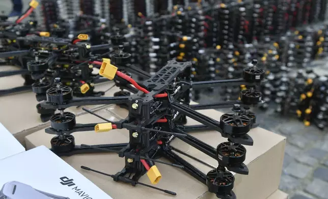 Over 800 FPV drones from the city volunteers are seen in central Lviv, western Ukraine, Friday, May 10, 2024. Lviv volunteers have handed over nearly 7 300 drones to the Ukrainian army over the year in the frame of project "Birds of Victory". (AP Photo/Mykola Tys)