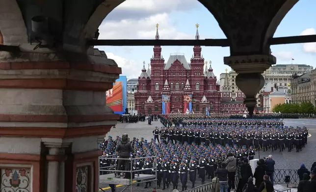 Russian soldiers march during the Victory Day military parade dress rehearsal at the Red Square in Moscow, Russia, Sunday, May 5, 2024. The parade will take place at Moscow's Red Square on May 9 to celebrate 79 years of the victory in WWII. (AP Photo/Alexander Zemlianichenko)