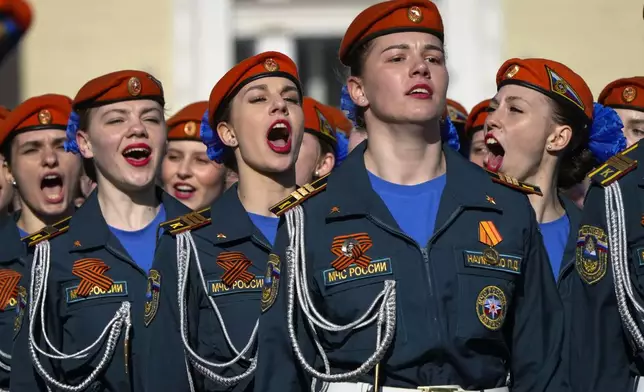 Russia's Emergency Situations Ministry female cadets march during a rehearsal for the Victory Day military parade which will take place at Dvortsovaya (Palace) Square on May 9 to celebrate 79 years after the victory in World War II in St. Petersburg, Russia, Tuesday, April 30, 2024. (AP Photo/Dmitri Lovetsky)