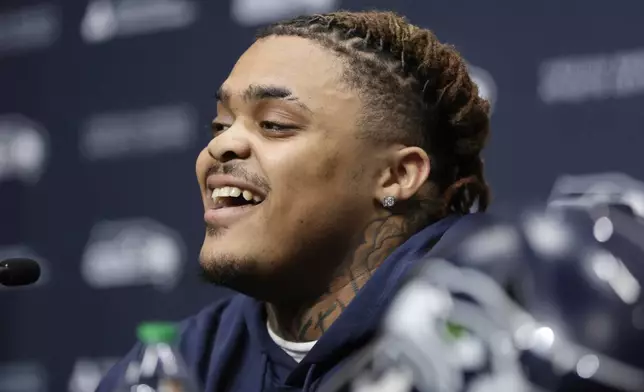 Seattle Seahawks 2024 first-round NFL football draft pick, Byron Murphy II smiles during a news conference at the team's headquarters Thursday, May 2, 2024, in Renton, Wash. (AP Photo/John Froschauer)