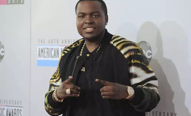 FILE - Sean Kingston arrives at the 40th Anniversary American Music Awards on Sunday Nov. 18, 2012, in Los Angeles. A SWAT team raided rapper Kingston's rented South Florida mansion on Thursday, May 23, 2024, and arrested his mother on fraud and theft charges that an attorney says stems partly from the installation of a massive TV at the home. Broward County detectives arrested Janice Turner, 61, at the home in a well-off Fort Lauderdale, Fla., suburb. (Photo by Jordan Strauss/Invision/AP, File)
