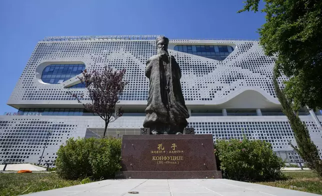 A statue of ancient Chinese philosopher Confucius stands in front of the Chinese Cultural Center in Belgrade, Serbia, Monday, April 29, 2024. Chinese leader Xi Jinping's visit to European ally Serbia on Tuesday, May 7, falls on a symbolic date: the 25th anniversary of the bombing of the Chinese Embassy in Belgrade during NATO's air war over Kosovo. (AP Photo/Darko Vojinovic)