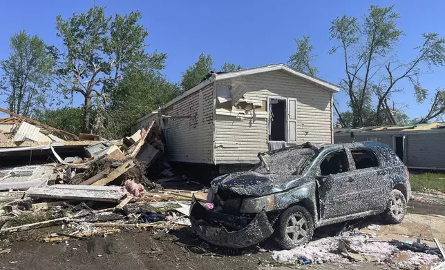 A mobile park home at Pavilion Estates near Kalamazoo, Mich. is destroyed on the morning of Wednesday, May 8, 2024 after a tornado had swept through the night before. (AP Photo/Joey Cappelletti)