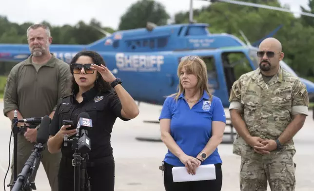 Harris County Judge Lina Hidalgo speaks before going up in a helicopter at David Wayne Hooks Memorial Airport to survey flood damage around the northern section of greater Houston, Saturday, May 4, 2024, in Spring, Texas. (Jason Fochtman/Houston Chronicle via AP)