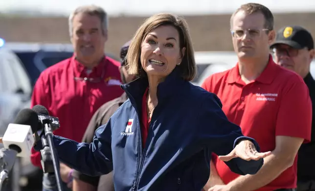 Iowa Gov. Kim Reynolds speaks during a news conference after touring tornado damage, Wednesday, May 22, 2024, in Greenfield, Iowa. (AP Photo/Charlie Neibergall)