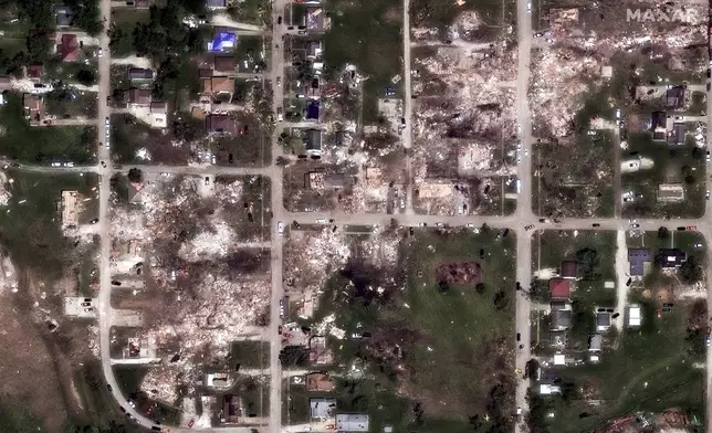 This Thursday, May 23, 2024 satellite image provided by Maxar Technologies shows destruction in Greenfield, Iowa after a Tuesday, May 21 tornado. (Maxar Technologies via AP) Satellite image ©2024 Maxar Technologies
