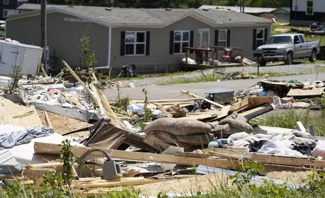 A home demolished by severe weather is seen along Barnsley Loop, Tuesday, May 28, 2024, in Madisonville, Ky. A series of powerful storms hit the central and southern U.S. over the Memorial Day holiday weekend. (AP Photo/George Walker IV)