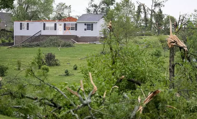 A storm damaged house is seen along Clara Mathis Road, Thursday, May 9, 2024, in Columbia, Tenn. Severe storms tore through the central and southeast U.S., Wednesday, spawning damaging tornadoes, producing massive hail, and killing two people in Tennessee. (AP Photo/George Walker IV)