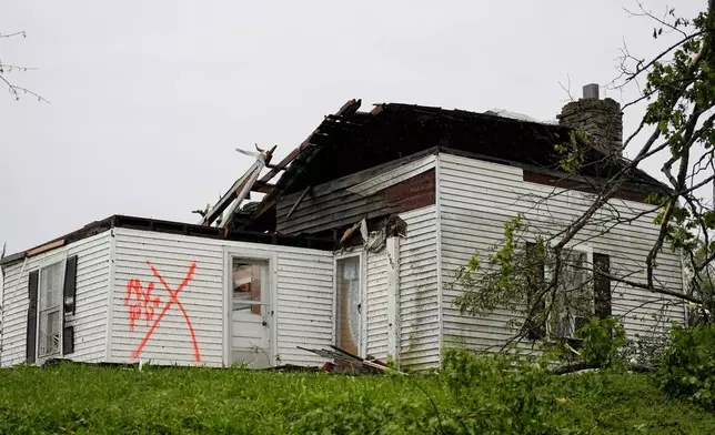 A storm damaged house is seen along Blackburn Lane, Thursday, May 9, 2024, in Columbia, Tenn. Severe storms tore through the central and southeast U.S., Wednesday, spawning damaging tornadoes, producing massive hail, and killing two people in Tennessee. (AP Photo/George Walker IV)