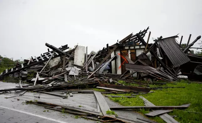 A storm damaged building is seen along Blackburn Lane, Thursday, May 9, 2024, in Columbia, Tenn. Severe storms tore through the central and southeast U.S., Wednesday, spawning damaging tornadoes, producing massive hail, and killing two people in Tennessee. (AP Photo/George Walker IV)