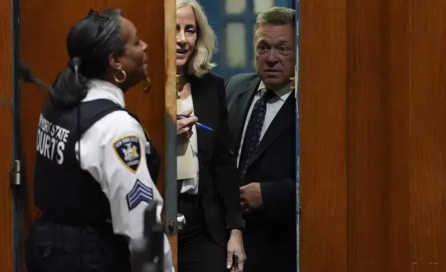 Diana Fabi Samson, second from left, and John Esposito, attorney's for Harvey Weinstein enter Queens criminal court, Thursday, May 9, 2024, in New York. Harvey Weinstein returned to court in New York City as authorities consider an extradition request from California to serve his sentence for a 2022 rape conviction. The 16-year sentence Weinstein received for raping a woman at a Los Angeles film festival in 2013 had been on ice while he served time in New York. (AP Photo/Julia Nikhinson)