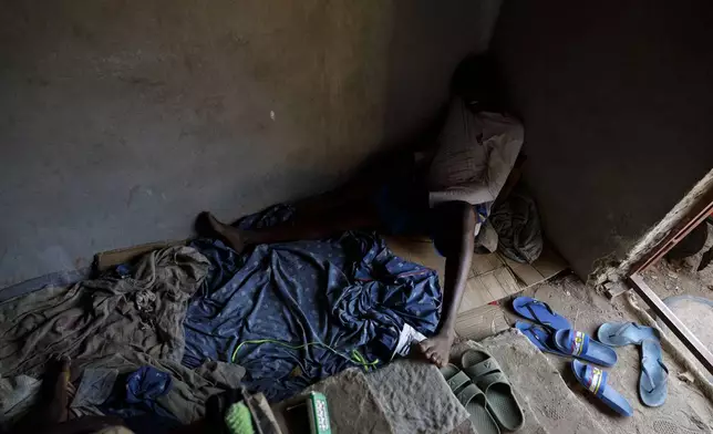 Kush users rest in a room where they receive care in an unconventional rehabilitation centre in the Bombay community, in Freetown, Sierra Leone, Thursday, April 25, 2024. Some youth in the Bombay community are helping Kush addicts stop by rehabilitating them. Over 70 drug users have received care and overcame drug abuse since January 2024. (AP Photo/ Misper Apawu)