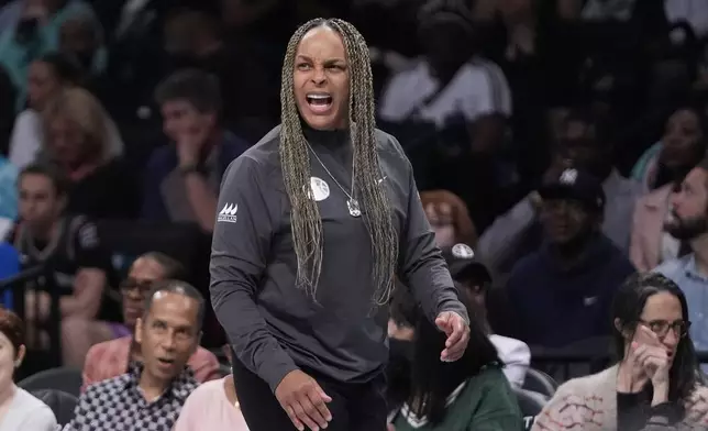 Chicago Sky coach Teresa Weatherspoon calls out to players during the first half of the team's WNBA basketball game against the New York Liberty, Thursday, May 23, 2024, in New York. (AP Photo/Frank Franklin II)