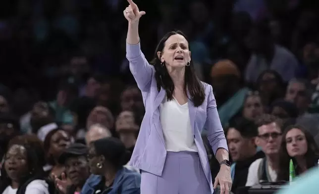 New York Liberty coach Sandy Brondello calls out to the team during the first half of a WNBA basketball game against the Chicago Sky, Thursday, May 23, 2024, in New York. (AP Photo/Frank Franklin II)