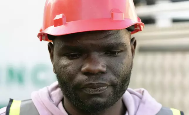 Construction worker, Joseph Malala, who survived the building collapse at the site of the ruins in George, South Africa, Wednesday, May 8, 2024. Rescue teams are into a third day searching for dozens of construction workers buried in the rubble of an unfinished five-story apartment building that collapsed in South Africa. (AP Photo/Nardus Engelbrecht)