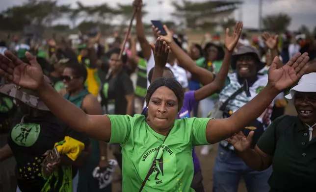Supporters of Ukhonto weSizwe party react during an election meeting in Mpumalanga, near Durban, South Africa, Saturday, May 25, 2024, ahead of the 2024 general elections scheduled for May 29. (AP Photo/Emilio Morenatti)
